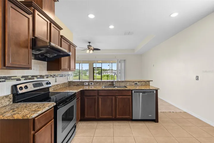 Kitchen Also Overlook Into Living Room And Backyard