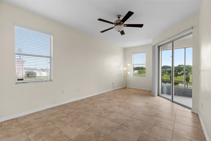 Spacious Primary Bedroom Has A Sliding Doors In Patio