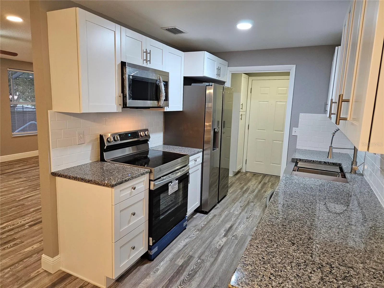 KITCHEN VIEW FROM DINING AREA