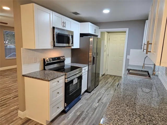 KITCHEN VIEW FROM DINING AREA