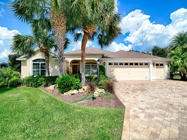 Front of Home, Beautiful palms on all sides of this home, golf and pond view in back