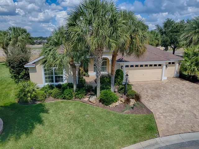 Front of home , peek at golf course and ponds behind it
