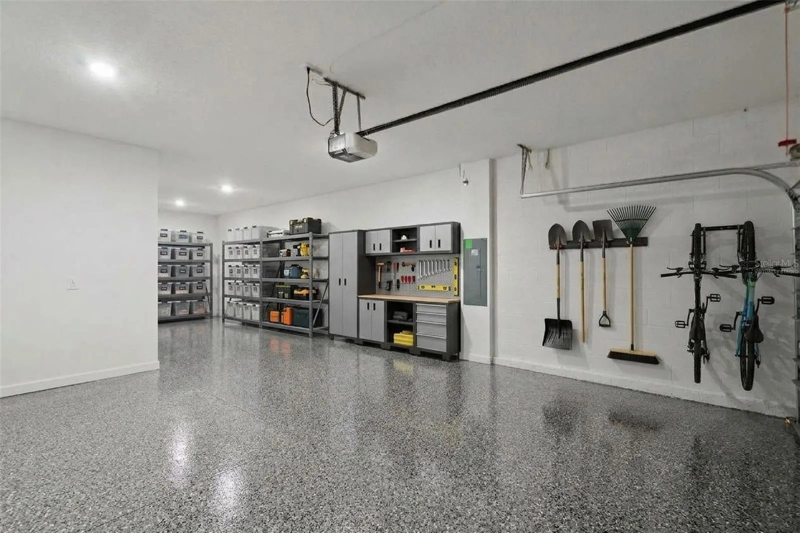 Virtually staged 3 car tandem garage 10'11" x 19' and 20' x 20'7"