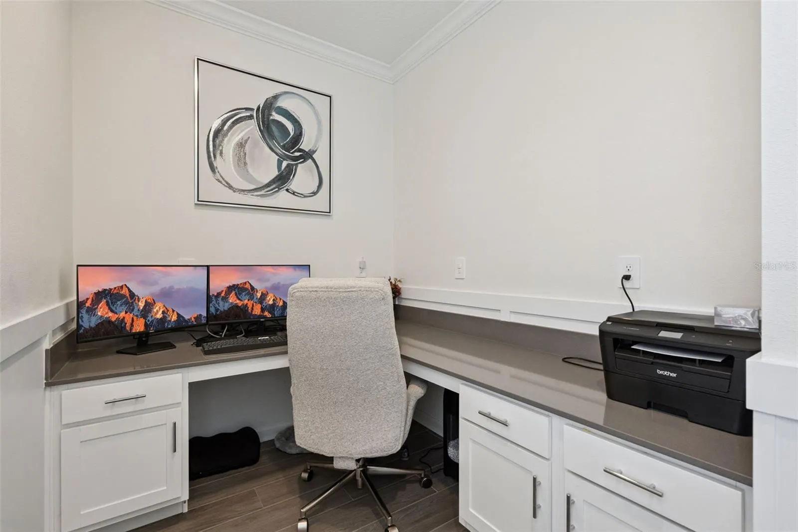 First floor tech area with built in cabinets