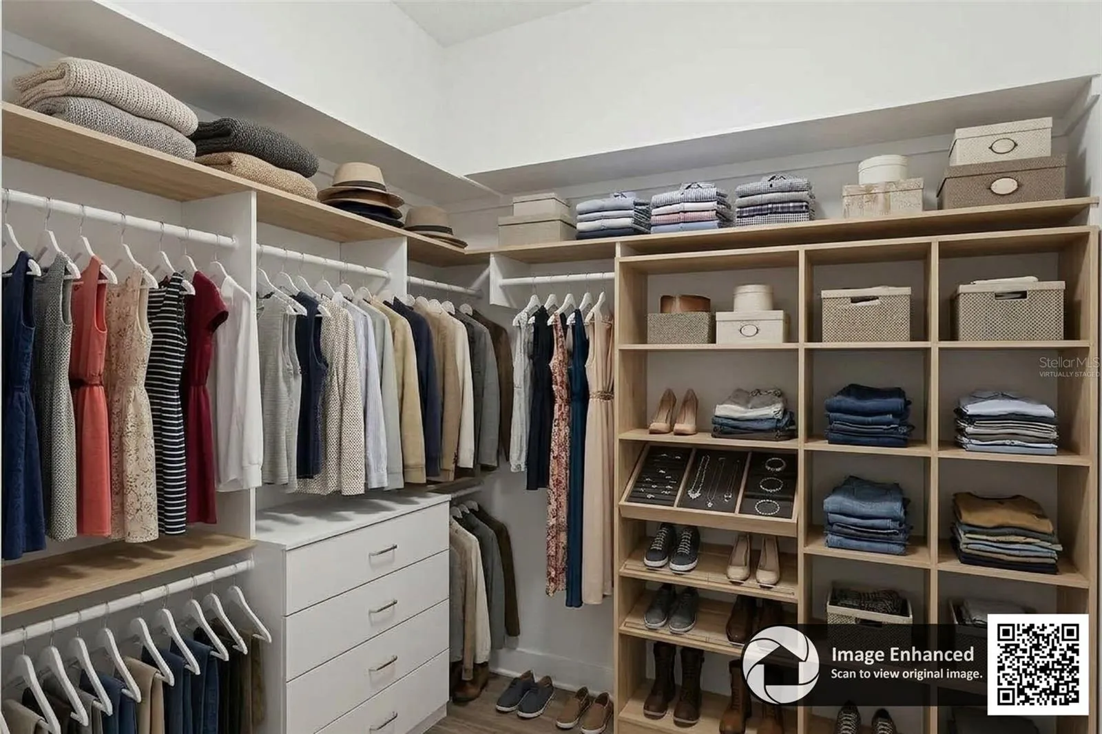 Virtually staged 1 of 2 owner's suite closet