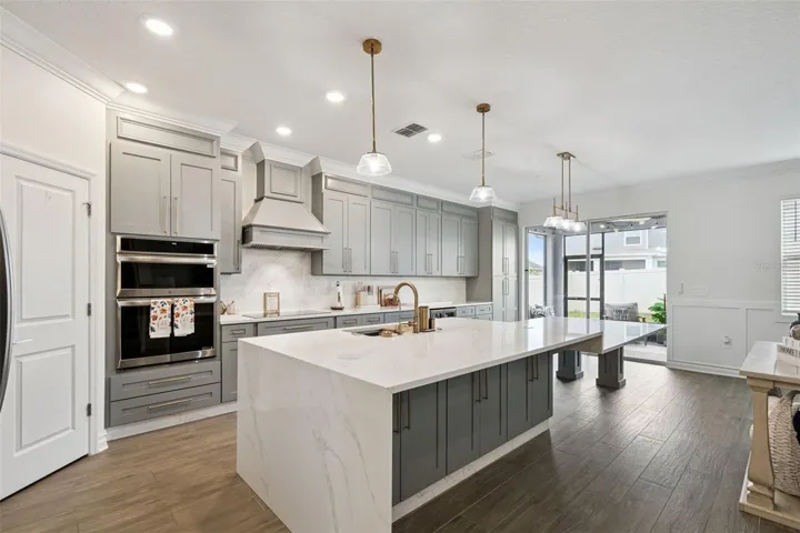 Beautiful UPGRADED wood look ceramic tile flooring throught the first floor