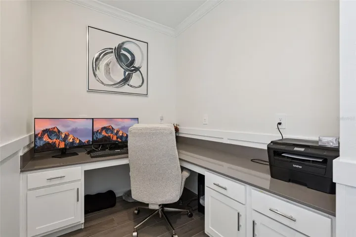 First floor tech area with built in cabinets