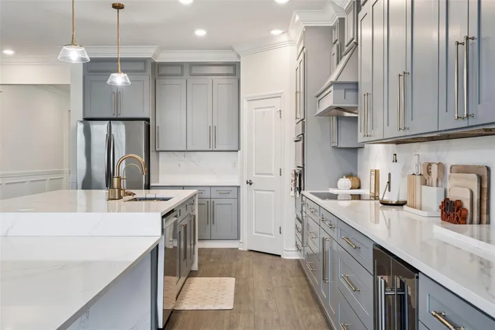 Wine refrigerator, plenty of tall cabinets