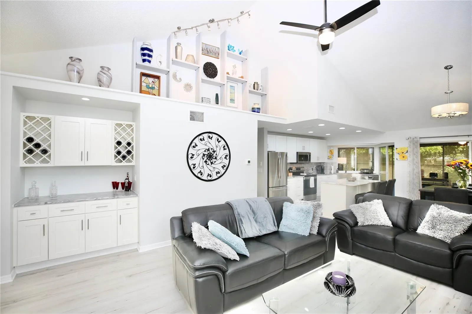 vaulted ceilings, new lighting and fan