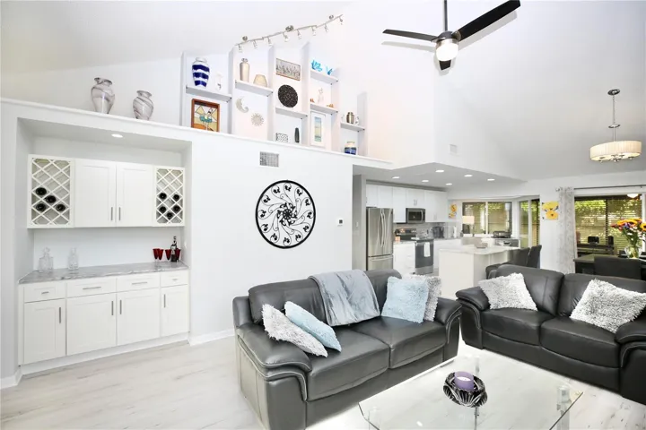 vaulted ceilings, new lighting and fan