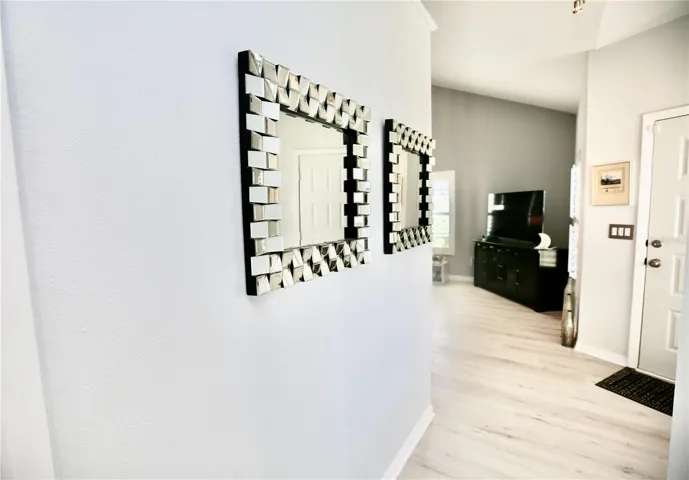 hallway to guest bedroom and bath