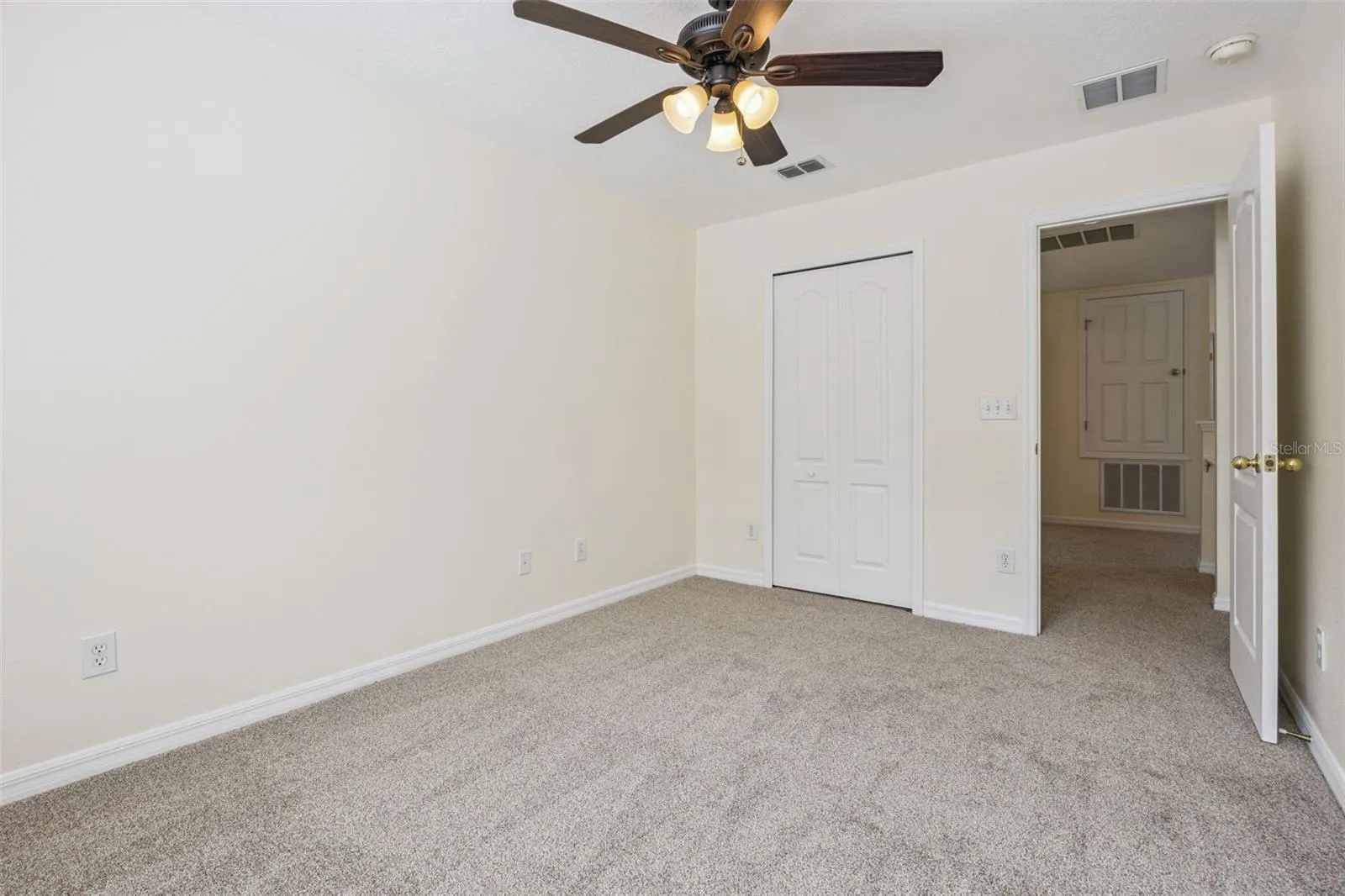 Bedroom 2 (9'8" x 12'9") with closet