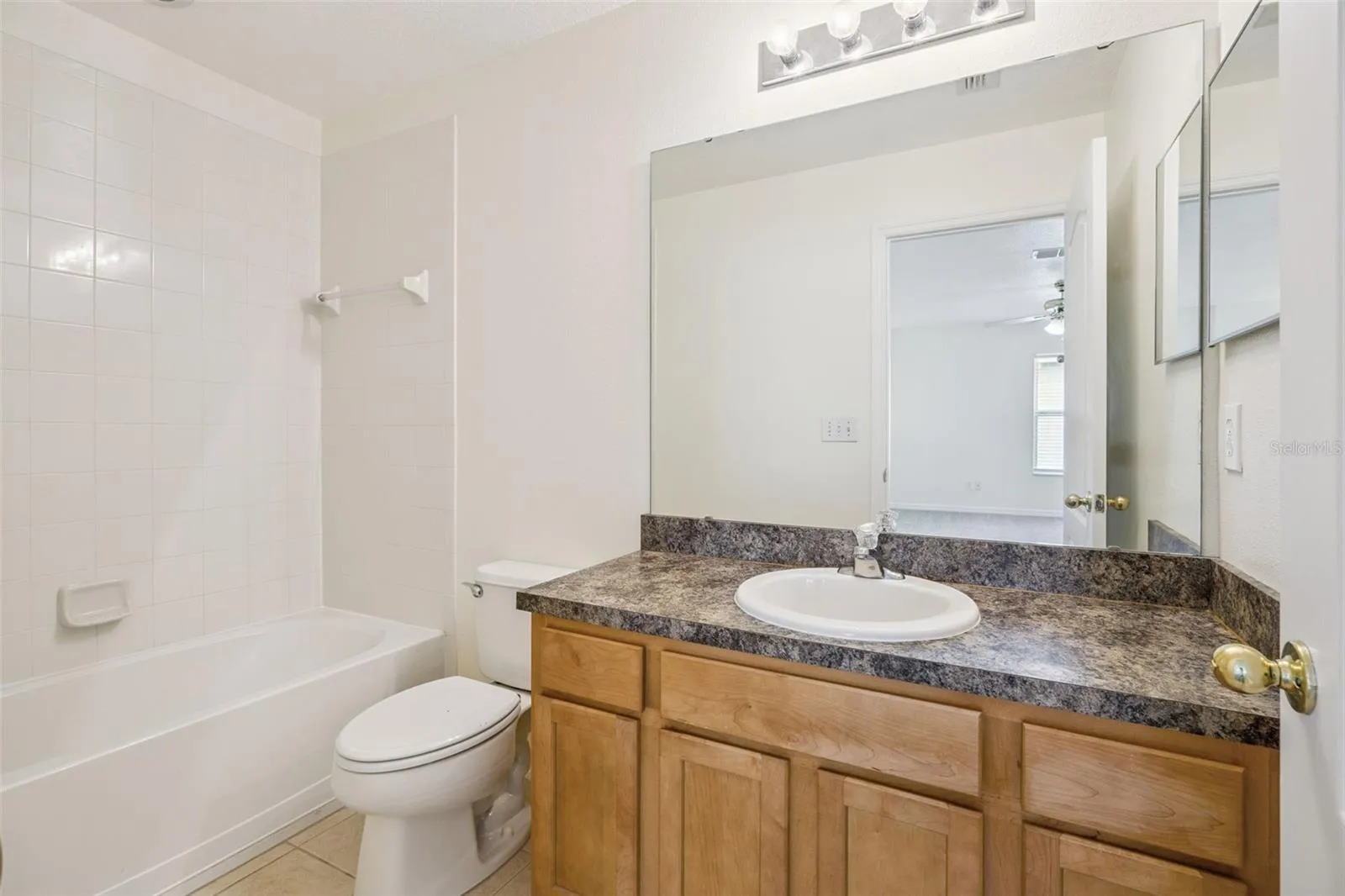 Second-floor hall bath (5'2" x 9'2") with tub/shower