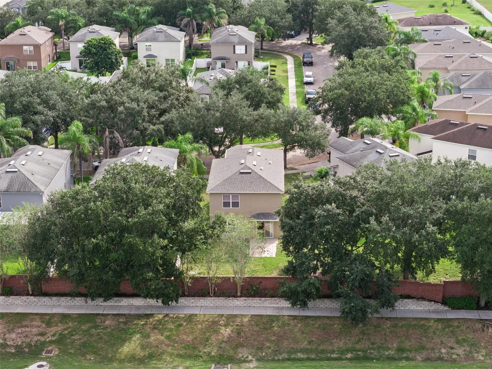 Aerial view of the home and street