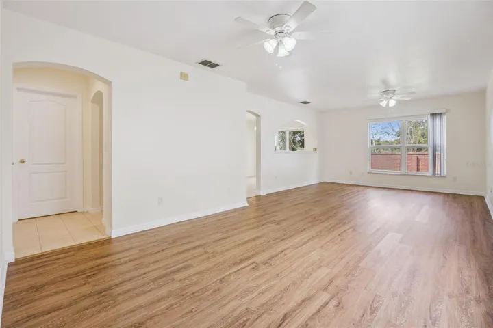 Dining room flows into the family room, new LVP flooring throughout