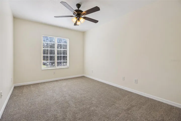 Bedroom 3 (9'6" x 17'11") with new carpet