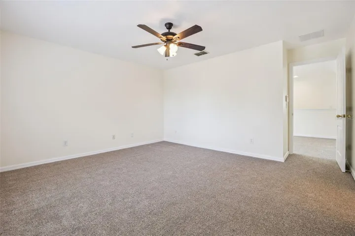 Primary bedroom (14'4" x 15'3")