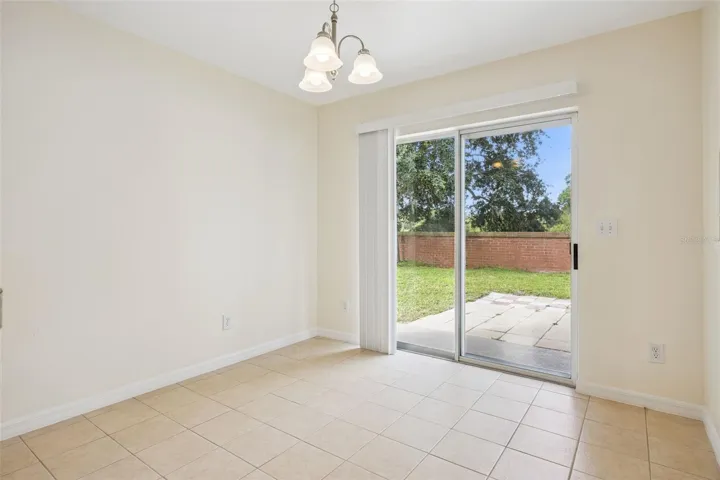 Breakfast nook (9'11" x 10'2") with sliding glass door to the patio