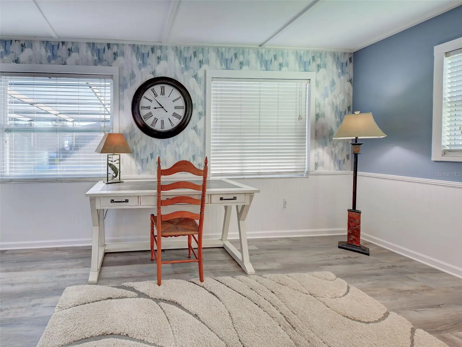 Natural light floods the large bonus room which could easily be an office or family room.