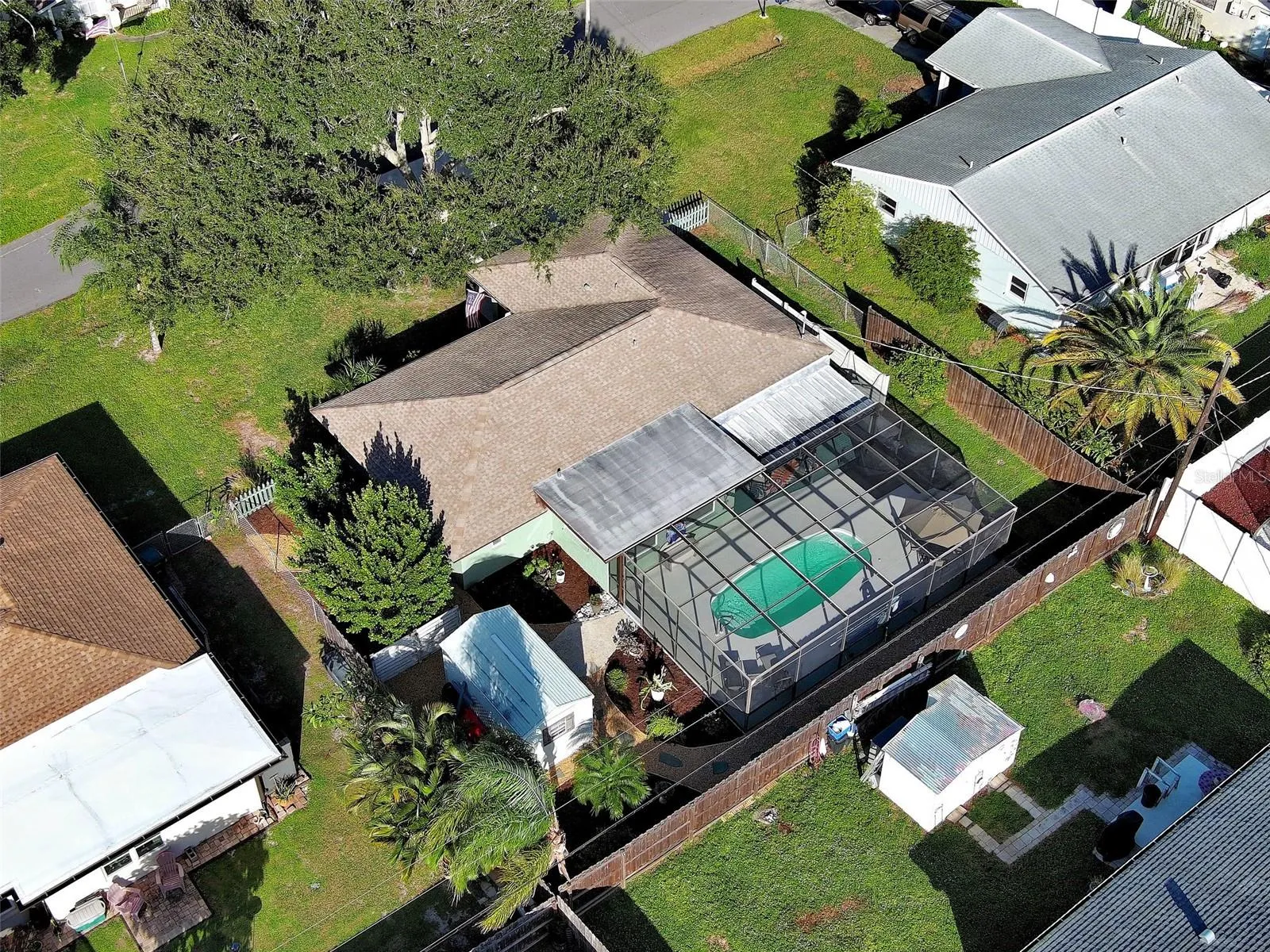 Bird's eye view of home with casita, newly resurfaced pool and fully fenced yard.