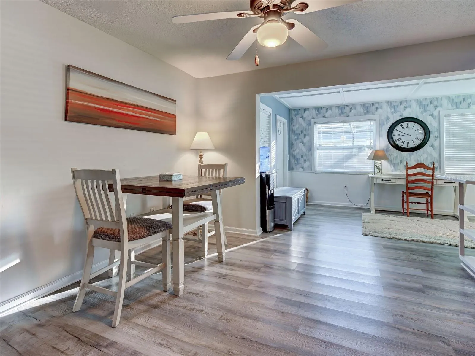 Cozy eating area flows seamlessly to the bonus room and kitchen.