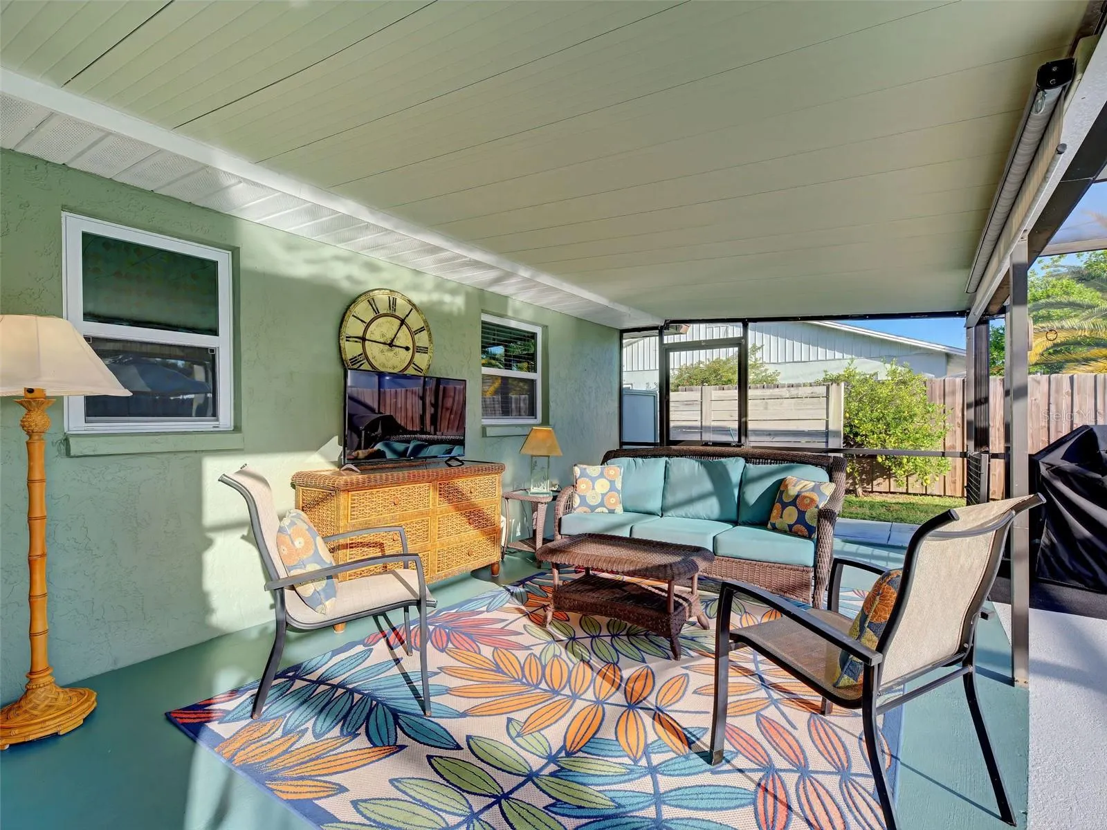 Large, covered lanai area is perfect for entertaining and enjoying the wonderful Florida weather.