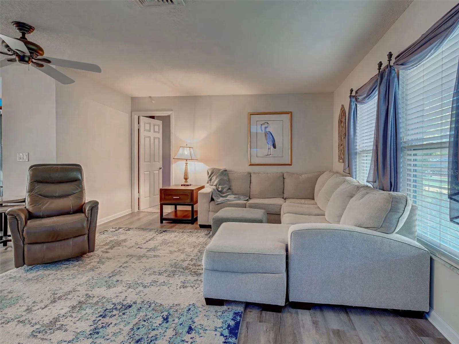 Spacious living room is just the place to relax or entertain.