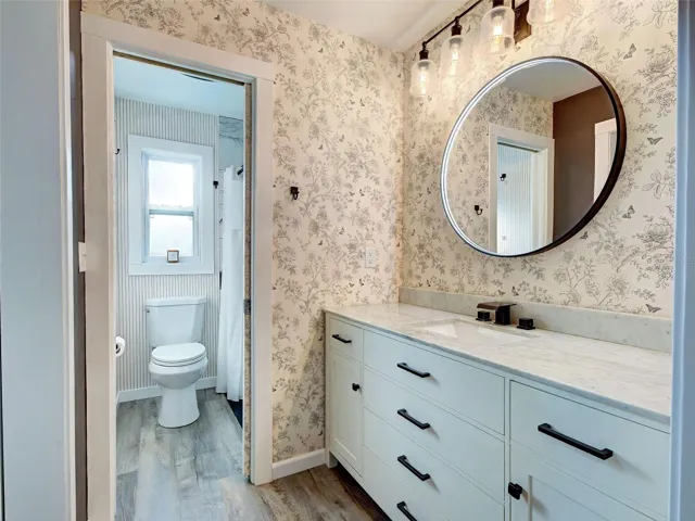 Beautifully remodeled primary bathroom is lovely.