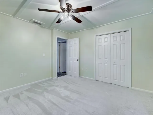 2nd bedroom has new carpet, new fan and large closet.