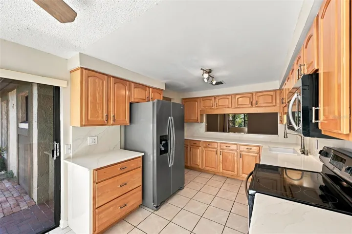 Kitchen with sliders to Courtyard