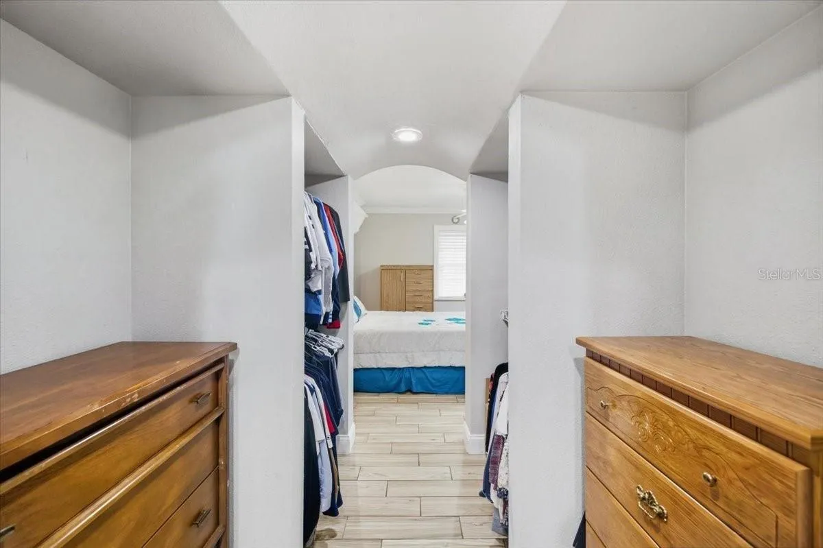 Primary Closet- Walk thru to Primary Suite