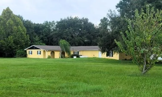 Pretty private home and lush extra lot