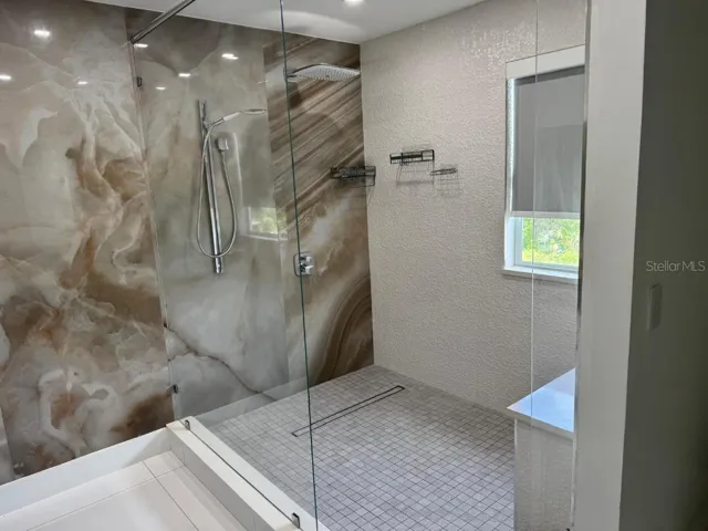 PRIMARY BATHROOM, SECOND FLOOR.