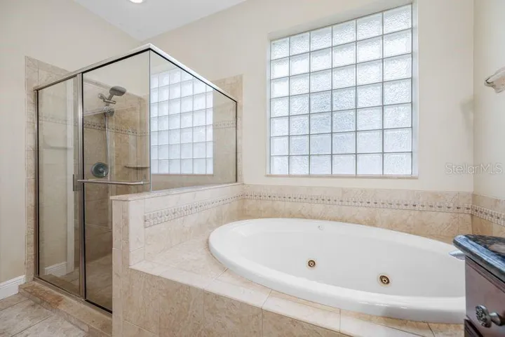 Primary Bath with Jetted Tub & Walk in Shower