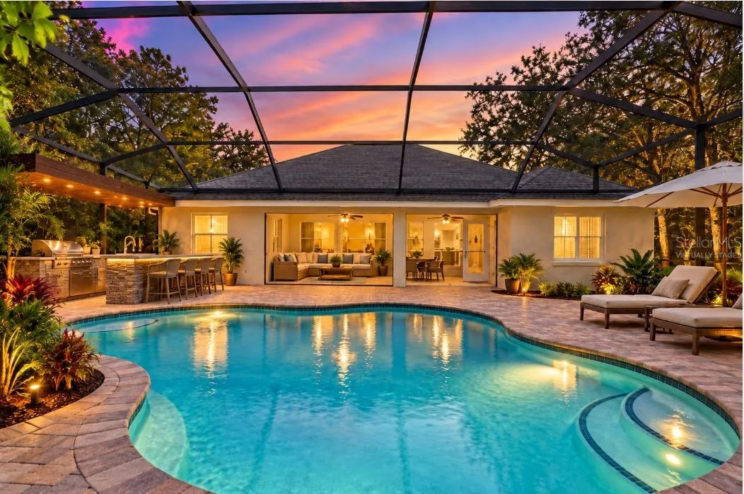 Virtually staged lanai, pool and outdoor kitchen