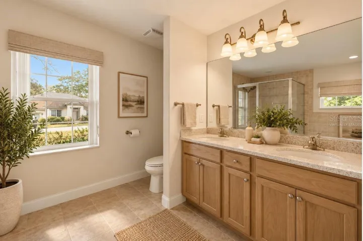 Virtually staged master bathroom.