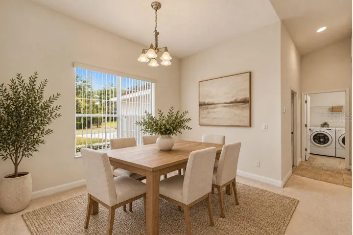 Virtually staged dining room.