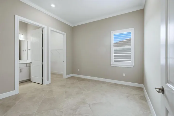 Guest bedroom two is ensuite and has a big walk in closet