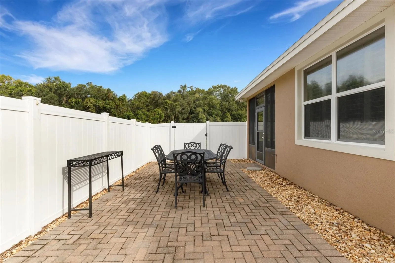 Completely fenced outdoor patio area