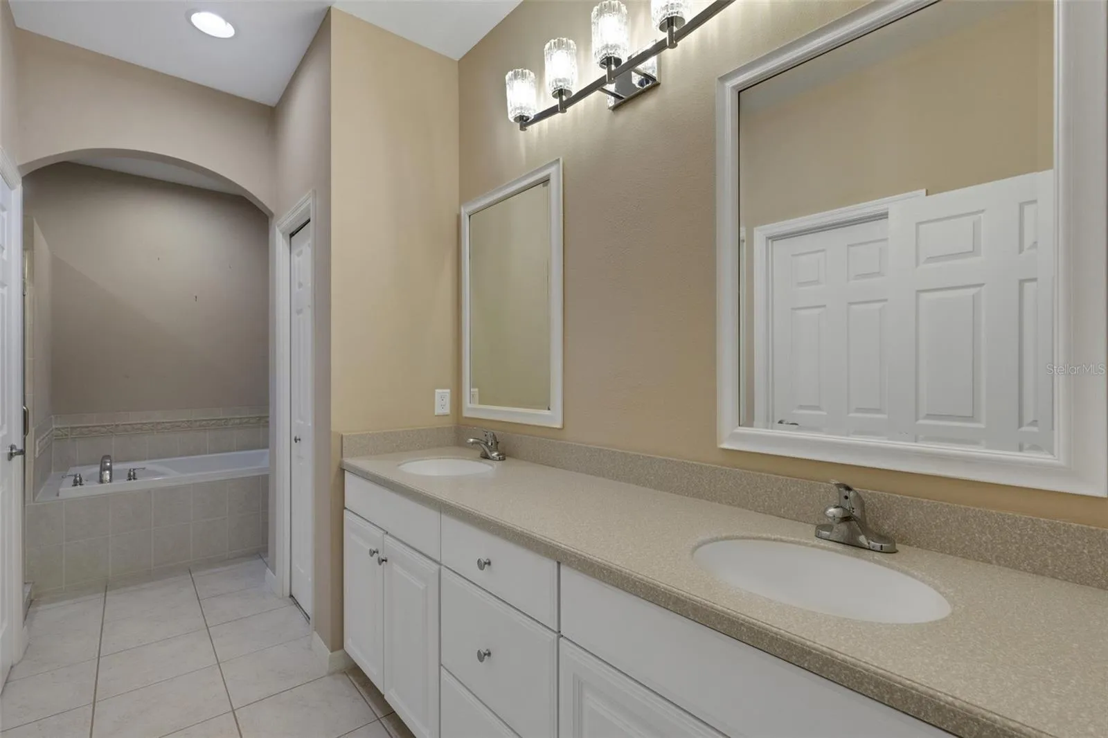 Primary tub with separate walk-in shower