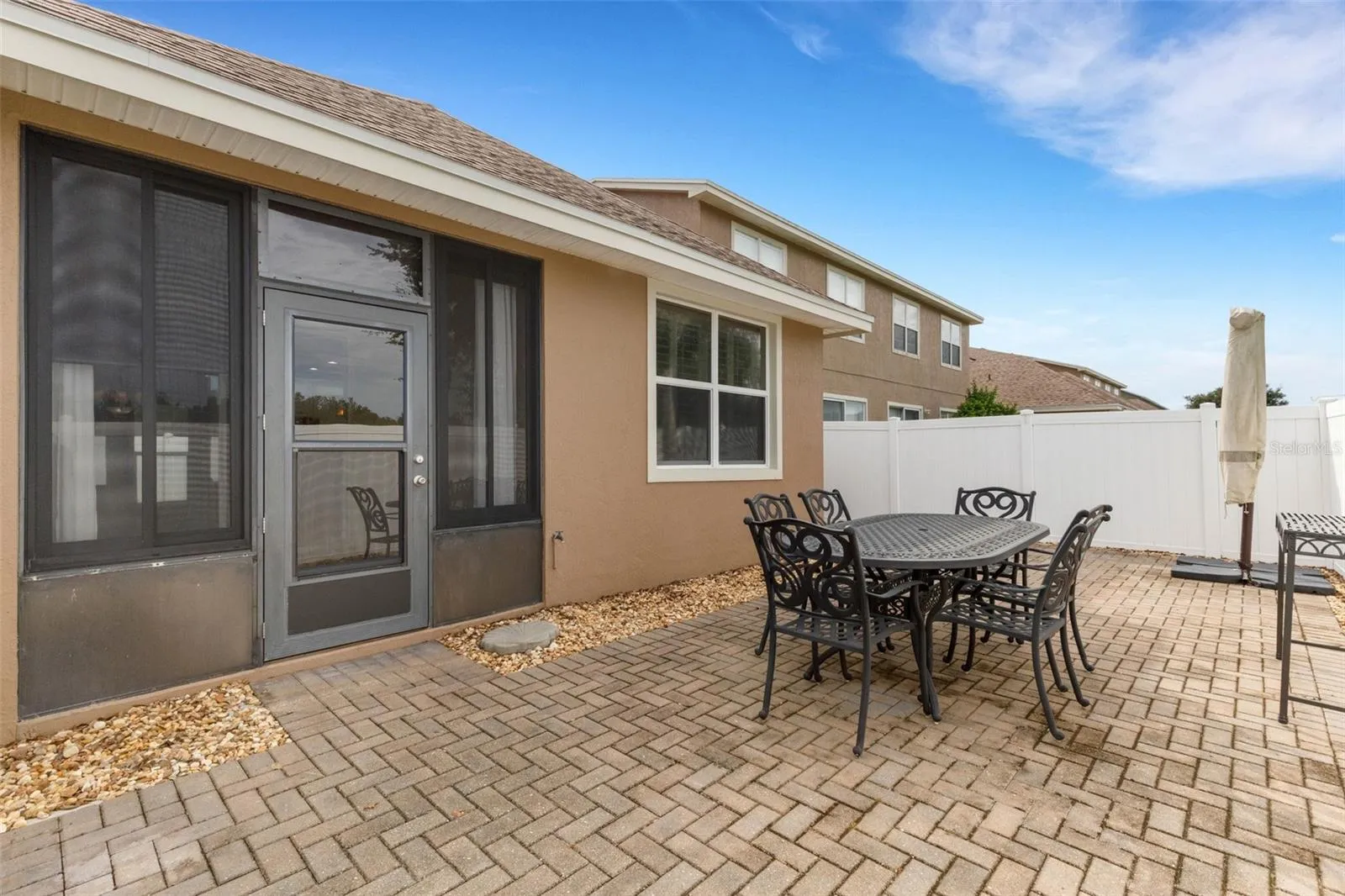 Completely fenced outdoor patio area
