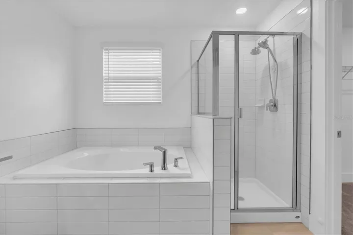 Primary Suite Garden Tub - Walk in shower