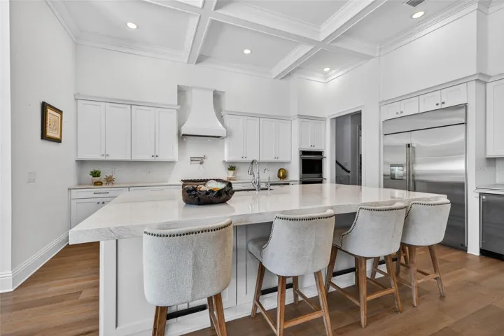 Beautifully appointed kitchen with custom cabinetry