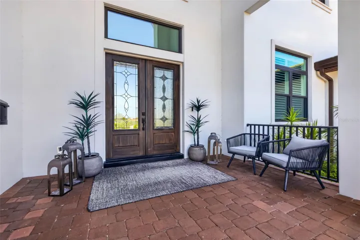 Refined Covered Entry Offering a Warm Welcome