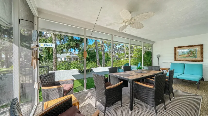Lanai Outdoor Seating with Pool and Garden View