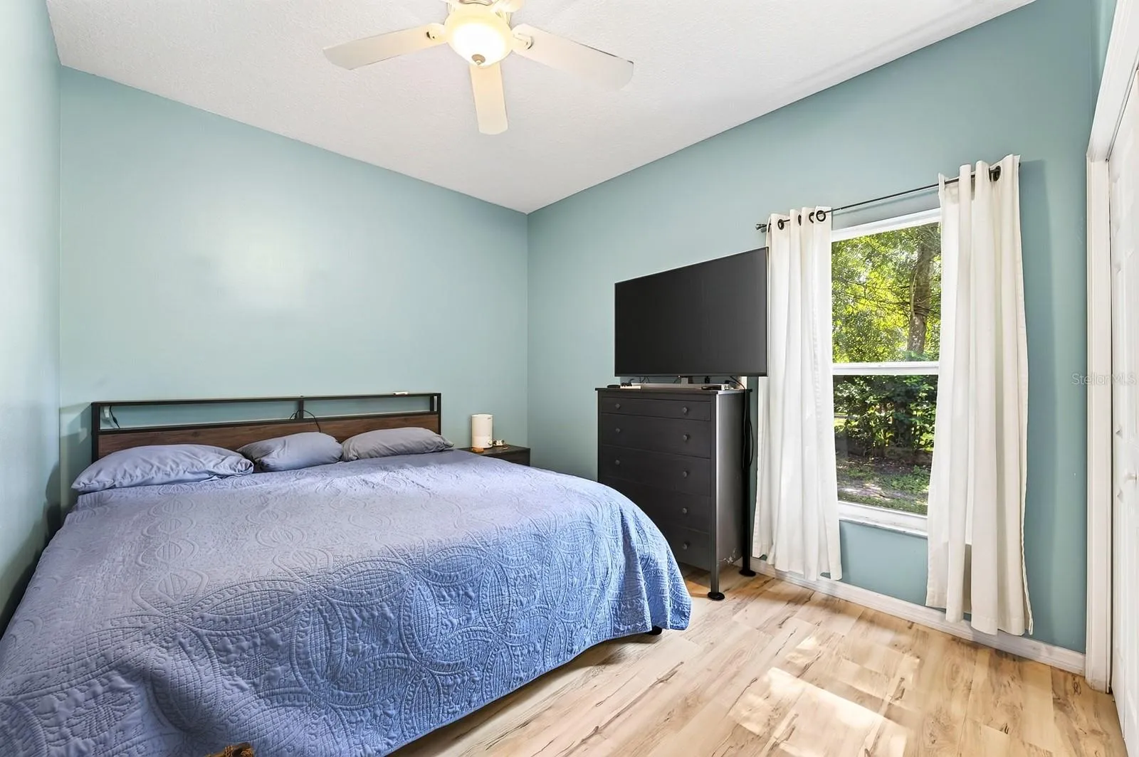 Two additional Bedrooms are positioned on the opposite side of the home. Bedroom 3