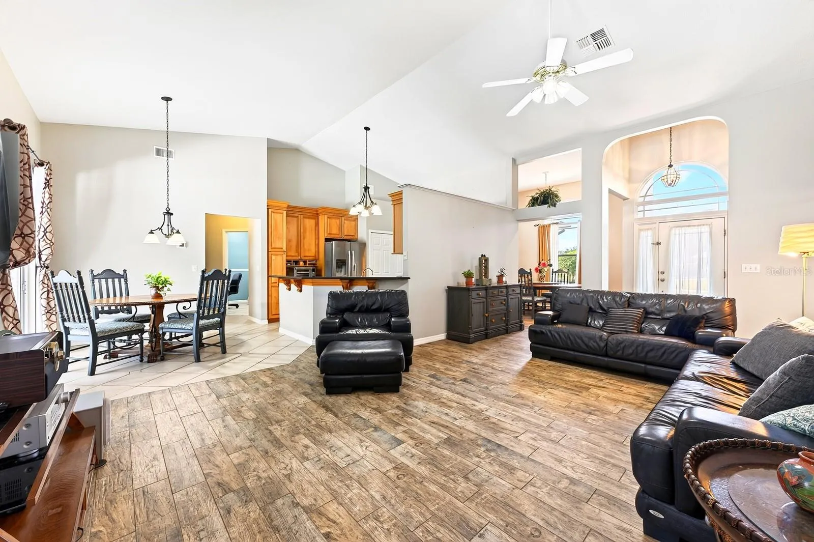 The OPEN FLOOR PLAN brings the Living Room and Kitchen together in a bright, welcoming space.