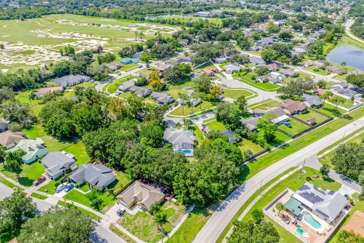 Aerial view of the back of the home and the community.