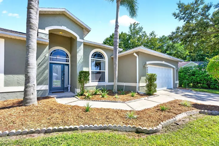 Step inside to cathedral ceilings, graceful architectural details and beautiful WOOD-LOOK TILE FLOORING throughout the main living areas.
