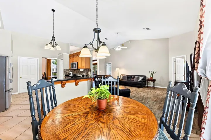 A LARGE EAT-IN BREAKFAST NOOK provides the perfect spot for casual meals.